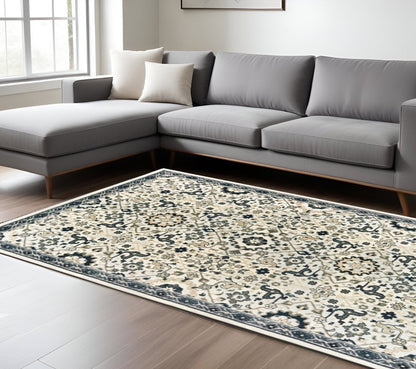 7' X 10' Ivory And Navy Blue Oriental Area Rug