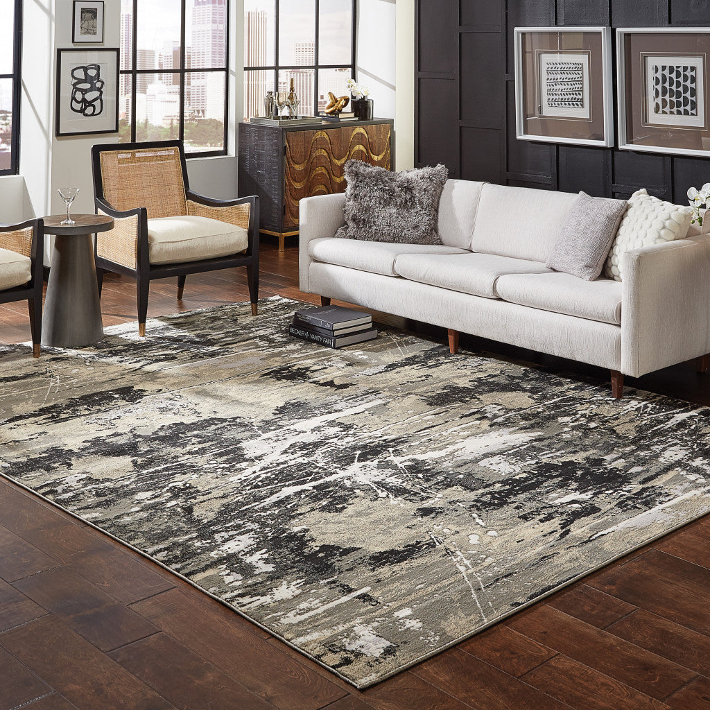 5' X 8' Black Gold Grey And Ivory Abstract Power Loom Stain Resistant Area Rug