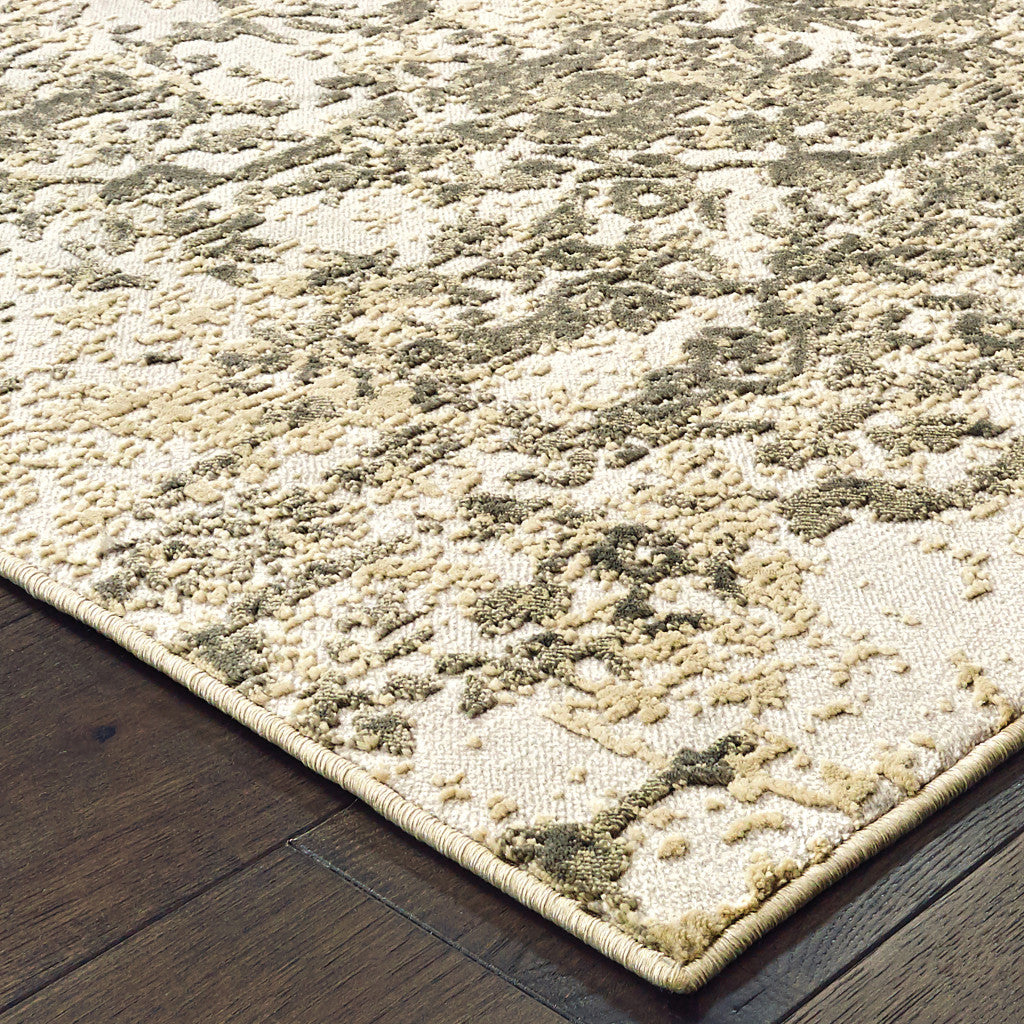 5' X 8' Grey And Gold Abstract Power Loom Stain Resistant Area Rug