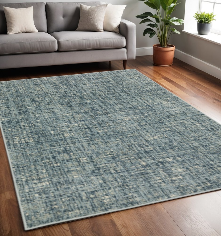 5' X 7' Dark Blue Light Blue Grey Ivory And Beige Abstract Power Loom Stain Resistant Area Rug