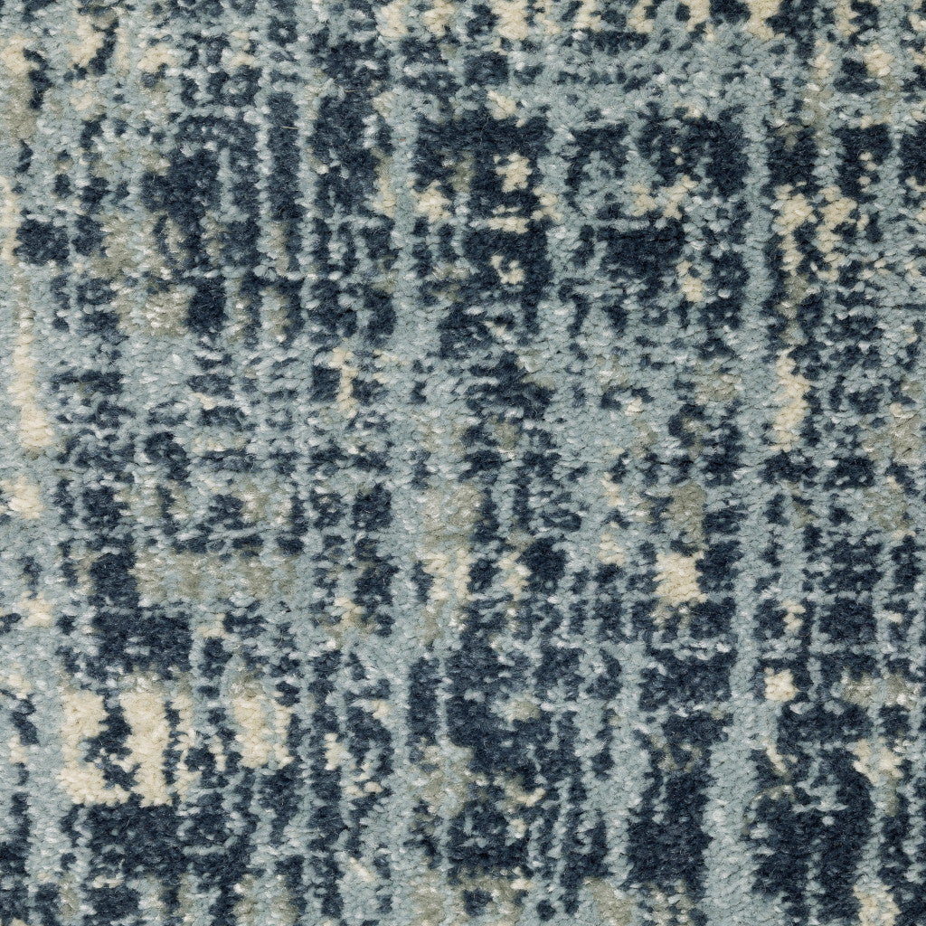 5' X 7' Dark Blue Light Blue Grey Ivory And Beige Abstract Power Loom Stain Resistant Area Rug