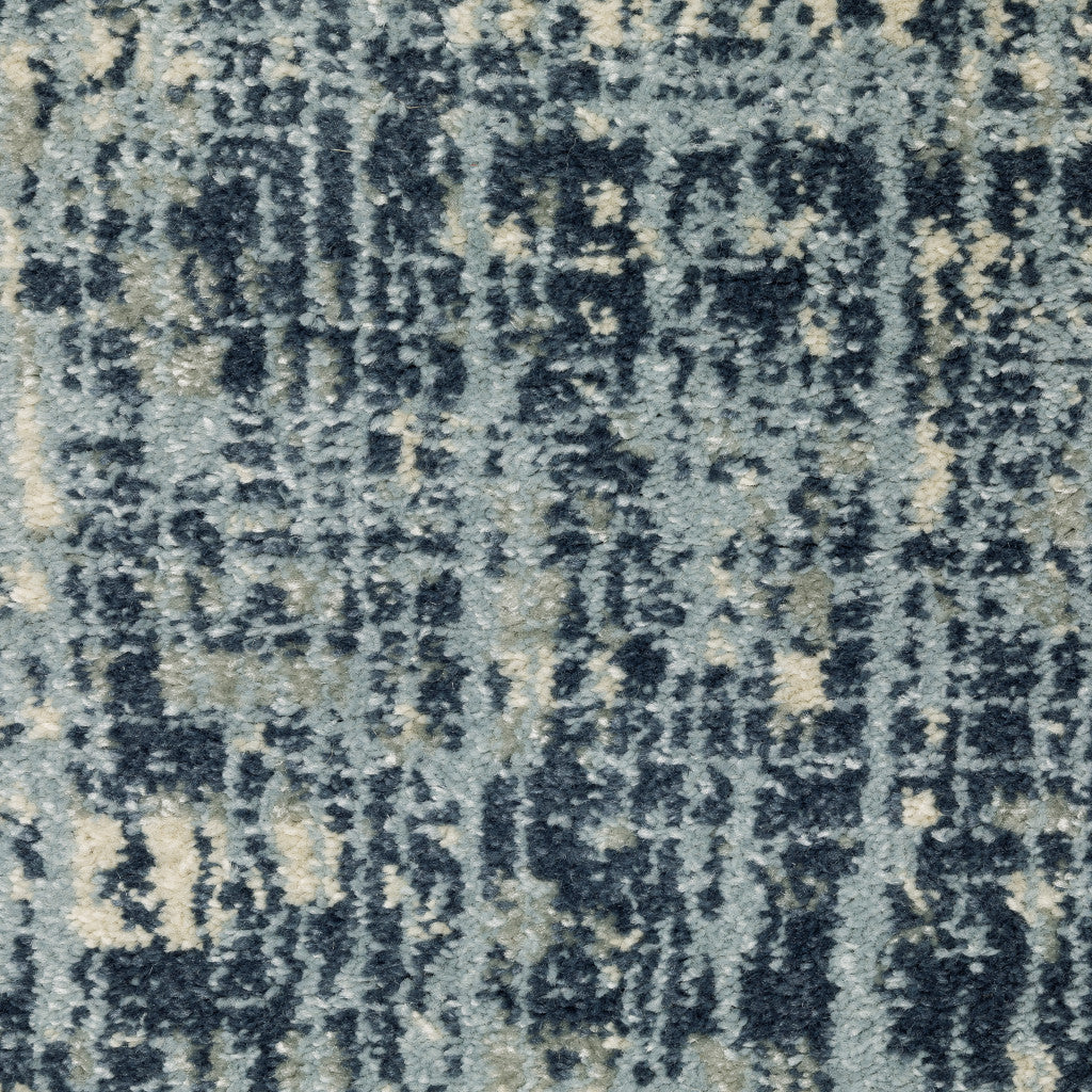 6' X 9' Dark Blue Light Blue Grey Ivory And Beige Abstract Power Loom Stain Resistant Area Rug