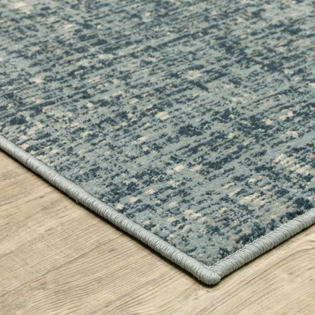 8' X 10' Dark Blue Light Blue Grey Ivory And Beige Abstract Power Loom Stain Resistant Area Rug