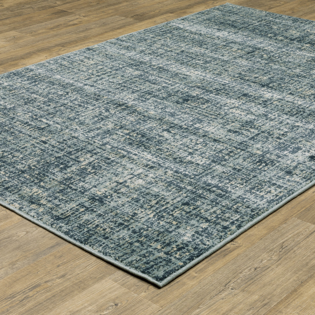 8' X 10' Dark Blue Light Blue Grey Ivory And Beige Abstract Power Loom Stain Resistant Area Rug