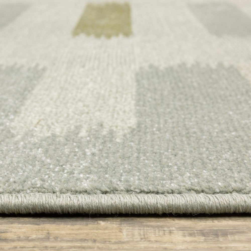 7' X 9' Beige And Ivory Geometric Area Rug