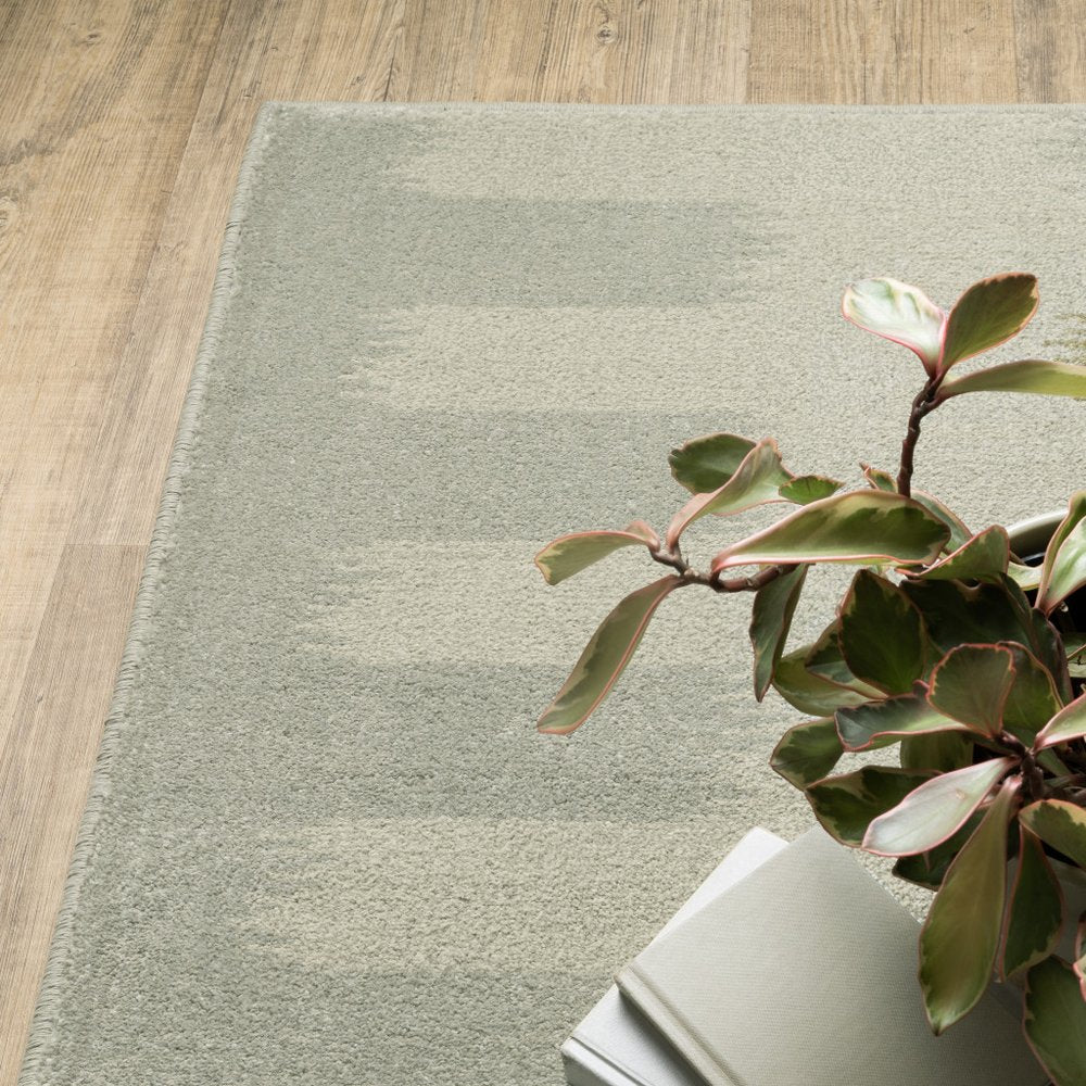 7' X 9' Beige And Ivory Geometric Area Rug