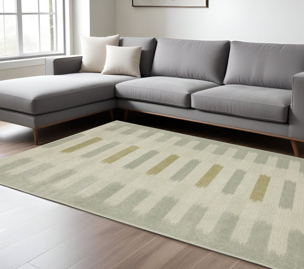 8' X 10' Beige Grey Gold And Green Geometric Power Loom Stain Resistant Area Rug