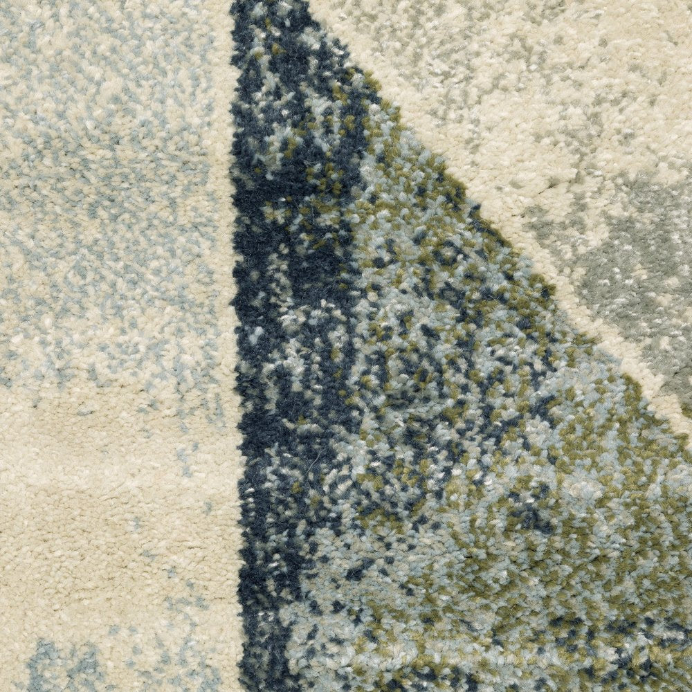10' x 13' blue, green, grey, gold and ivory geometric power loom stain-resistant area rug