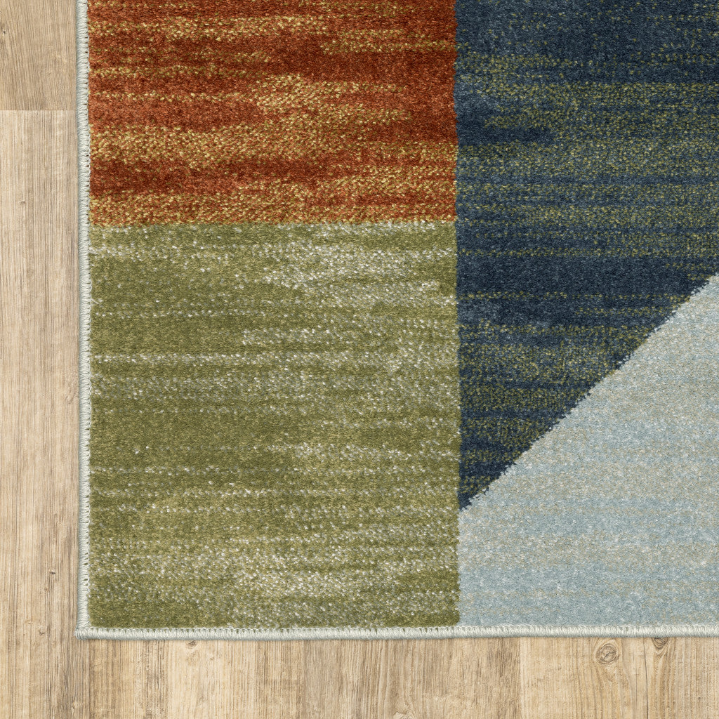 6' X 9' Grey Teal Blue Rust Green And Ivory Geometric Power Loom Stain Resistant Area Rug
