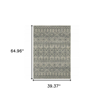Blue and beige geometric, power-loomed area rug, 3' X 5', stain resistant.