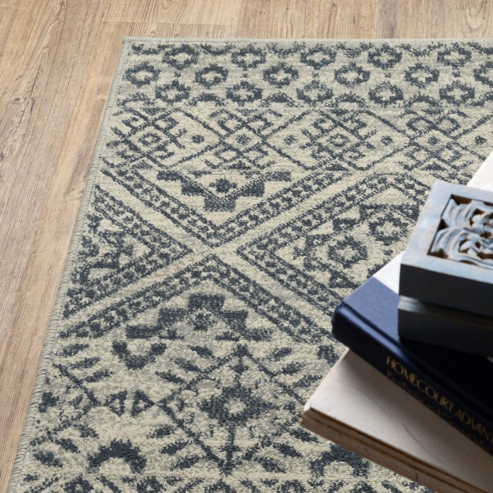 3' X 5' blue and beige geometric power loom stain resistant area rug