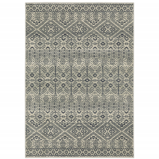 5' X 7' Blue And Beige Geometric Power Loom Stain Resistant Area Rug