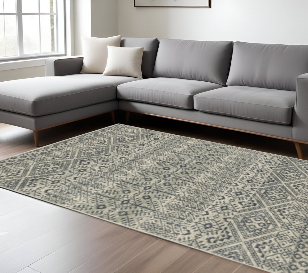 7' X 9' Blue And Beige Geometric Area Rug