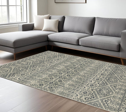 7' X 9' Blue And Beige Geometric Area Rug