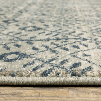 7' X 9' Blue And Beige Geometric Area Rug