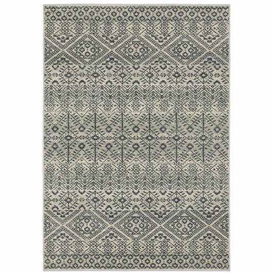 10' X 13' Blue And Beige Geometric Power Loom Stain Resistant Area Rug