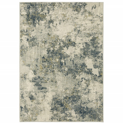 Abstract beige area rug with teal, grey and gold mottled pattern, modern distressed look.