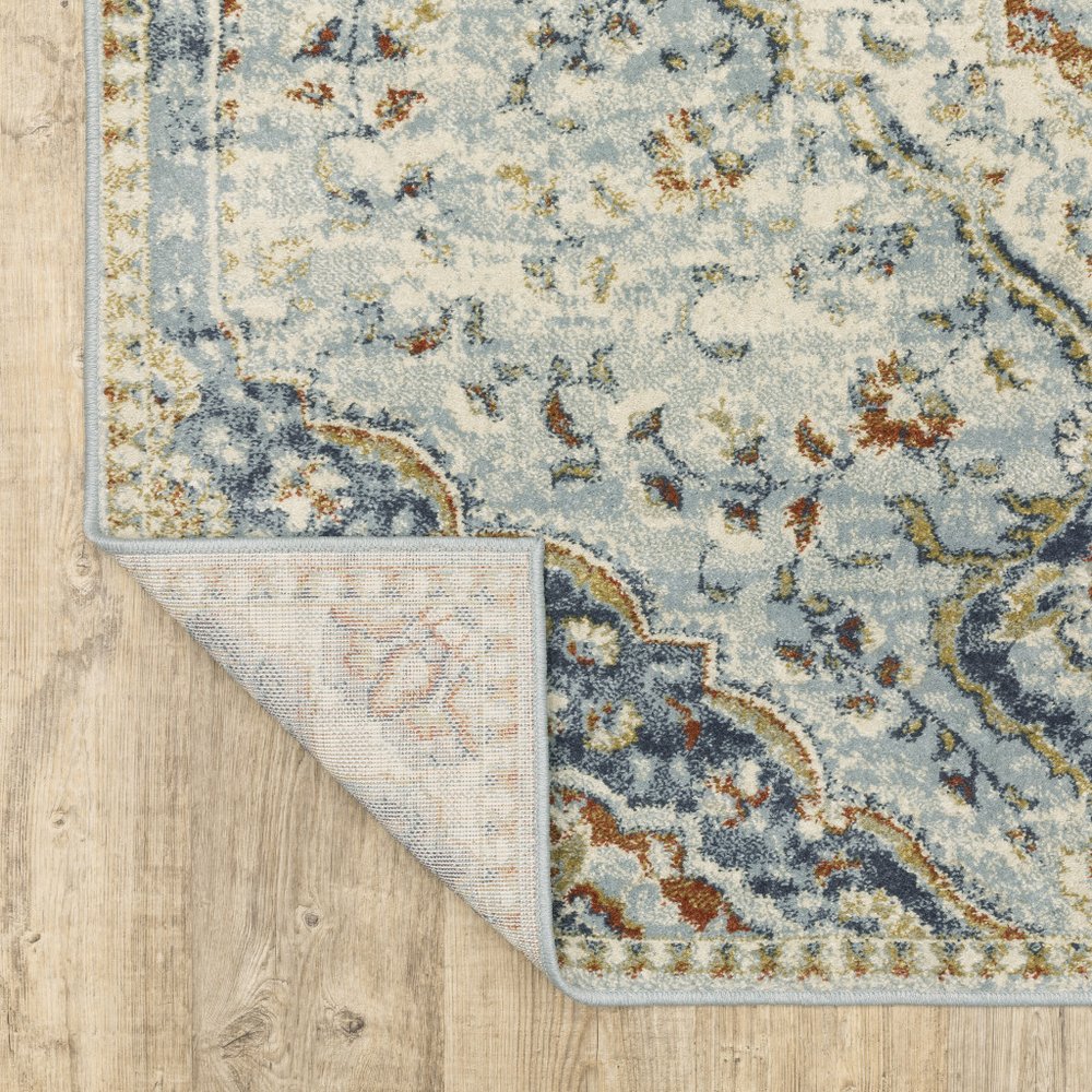 5' x 7' blue beige rust gold and teal oriental power loom stain-resistant area rug