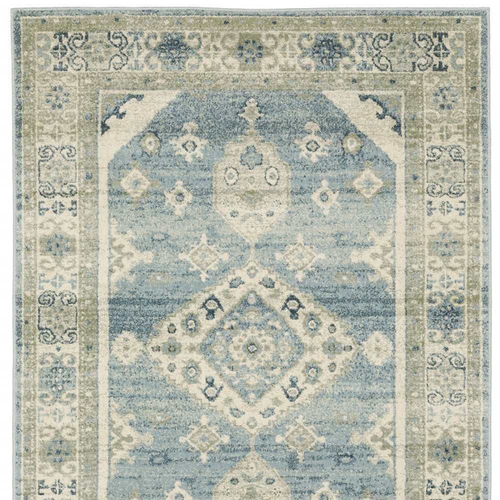 5' X 7' Blue And Beige Oriental Distressed Area Rug