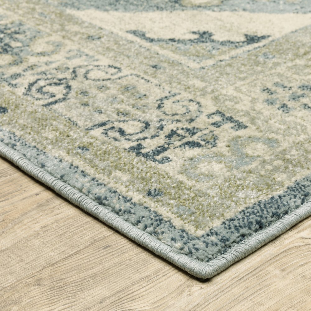 5' X 7' Blue And Beige Oriental Distressed Area Rug