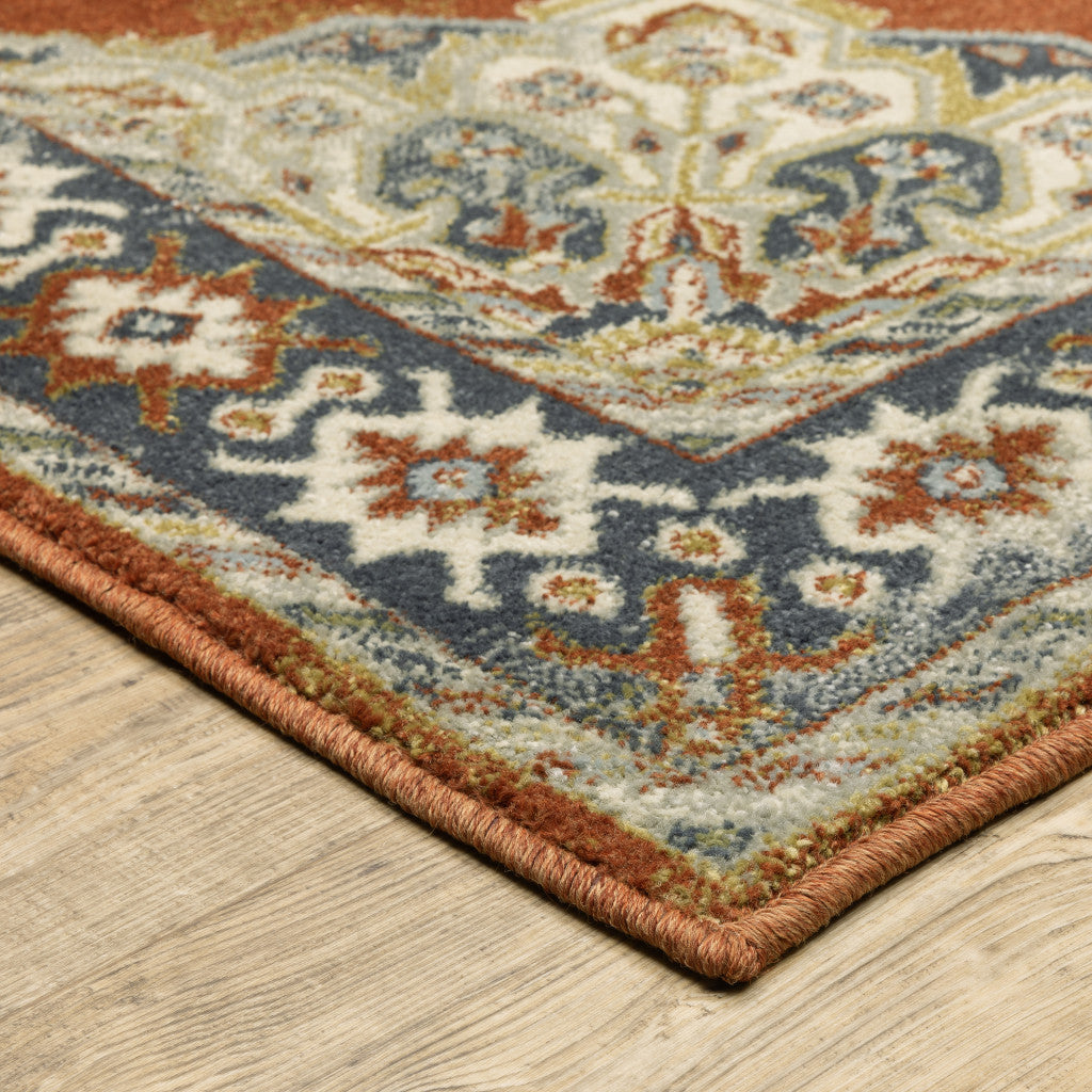 5' X 7' Rust Beige Teal Blue And Gold Oriental Power Loom Stain Resistant Area Rug