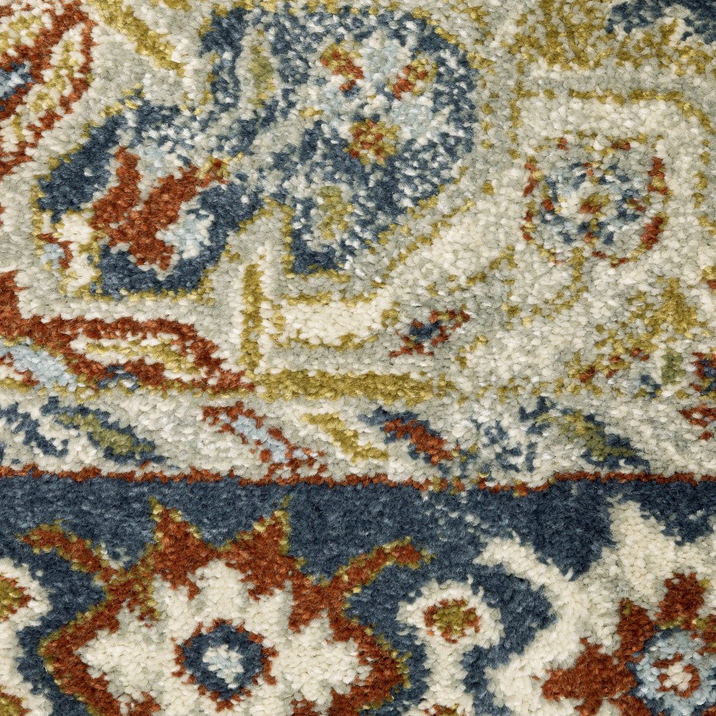 10' X 13' Rust Beige Teal Blue And Gold Oriental Power Loom Stain Resistant Area Rug