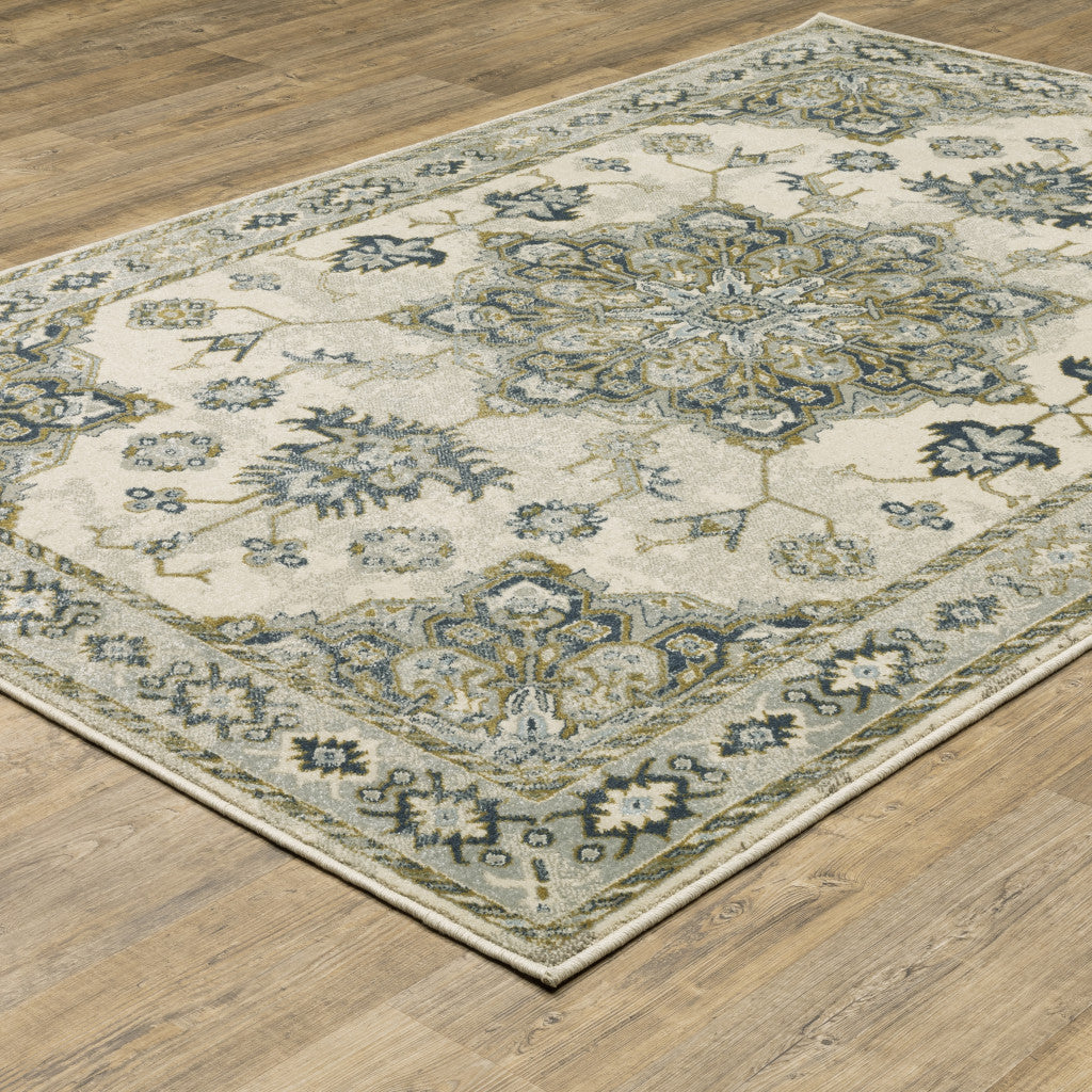3' X 5' Ivory Blue Teal Grey And Olive Green Oriental Power Loom Stain Resistant Area Rug