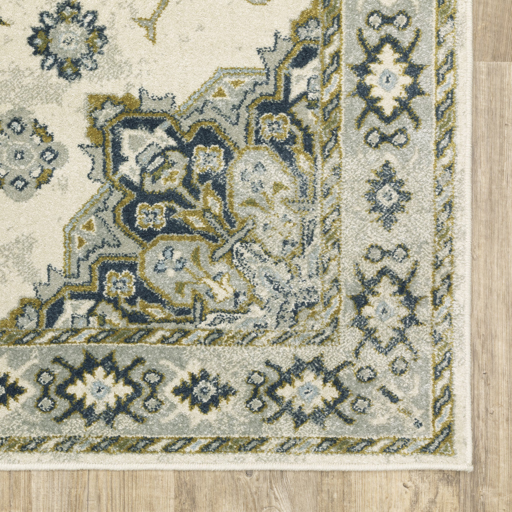 5' X 7' Ivory Blue Teal Grey And Olive Green Oriental Power Loom Stain Resistant Area Rug