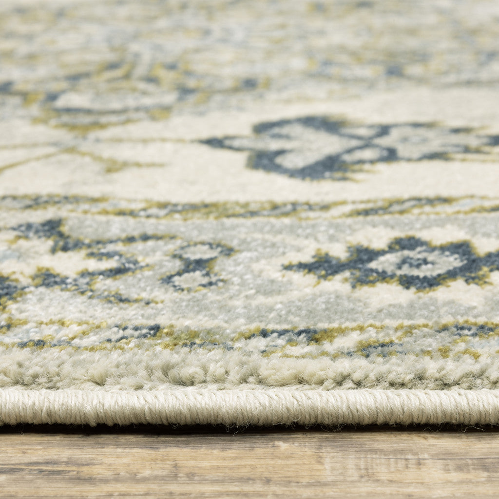 5' X 7' Ivory Blue Teal Grey And Olive Green Oriental Power Loom Stain Resistant Area Rug
