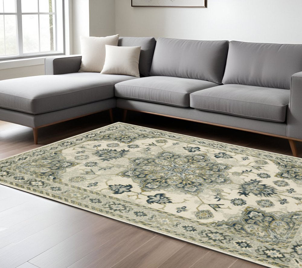 7' X 9' Ivory And Blue Oriental Distressed Area Rug