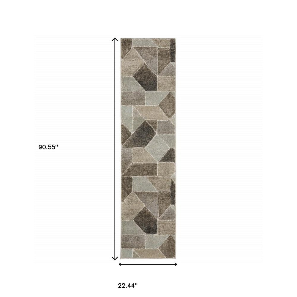 2' x 8' runner rug with a geometric pattern in grey, brown, beige, tan, taupe and ivory; power-loomed and stain resistant.