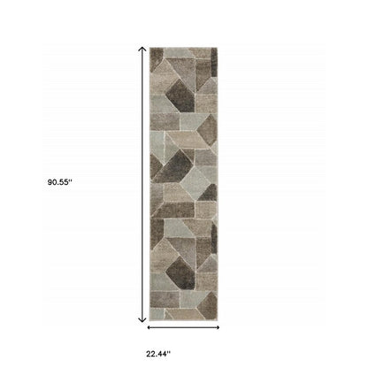 2' x 8' runner rug with a geometric pattern in grey, brown, beige, tan, taupe and ivory; power-loomed and stain resistant.