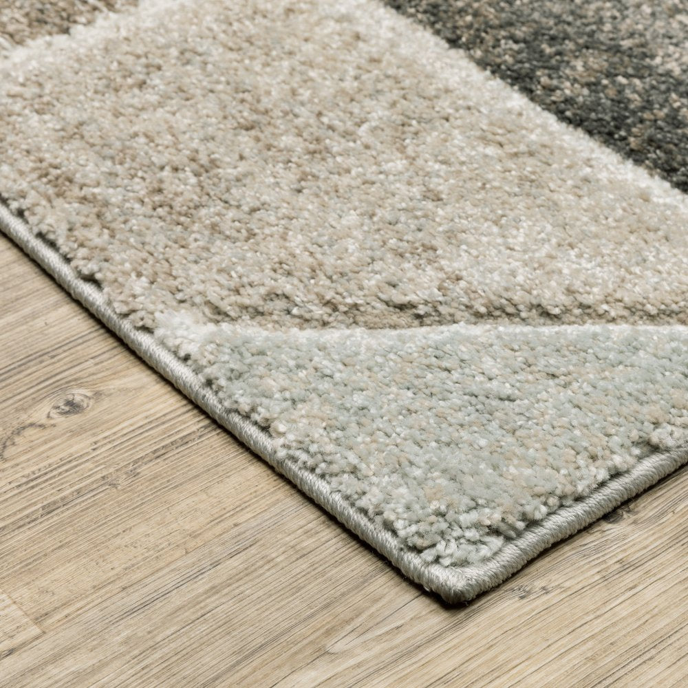 7' X 10' Gray And Ivory Geometric Area Rug