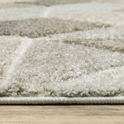 7' X 10' Gray And Ivory Geometric Area Rug