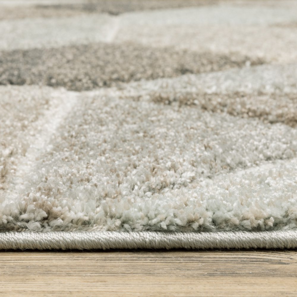 7' X 10' Gray And Ivory Geometric Area Rug