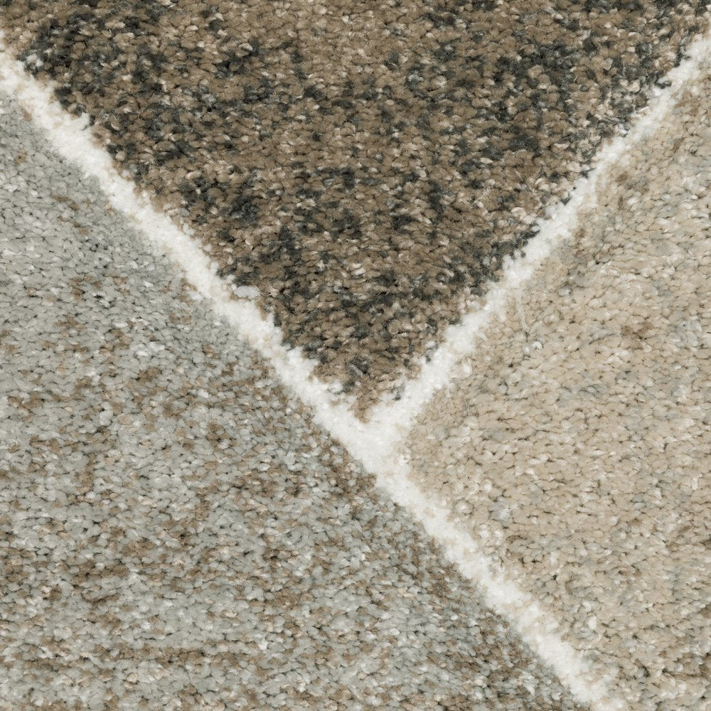 7' X 10' Gray And Ivory Geometric Area Rug
