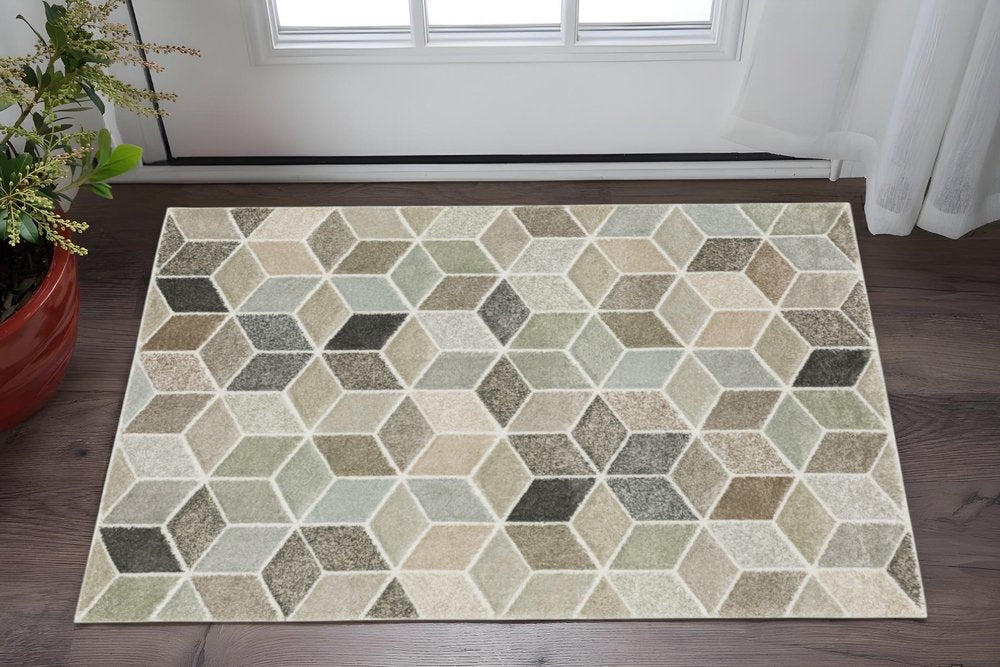3' x 5' beige, brown, grey, tan, sage and pale blue geometric power loom stain-resistant area rug.