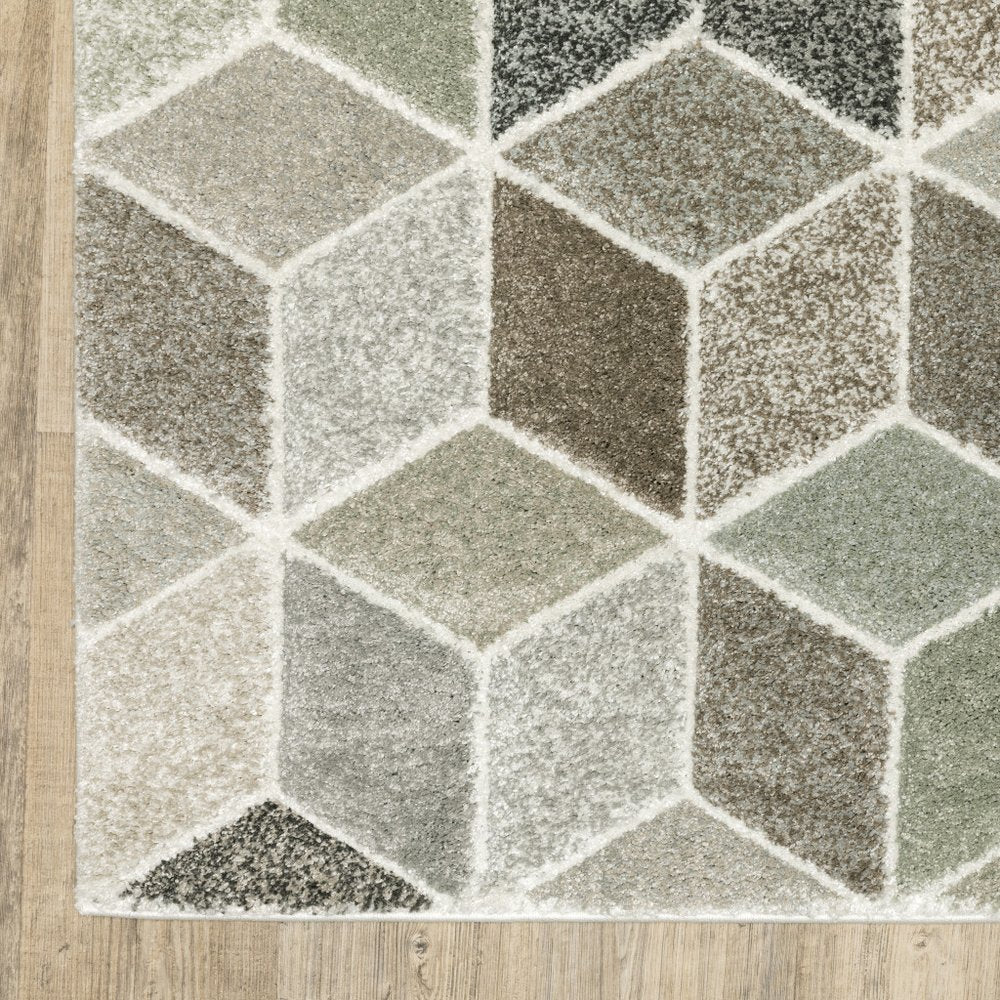 3' x 5' geometric power loom area rug in beige, brown, grey, tan, sage and pale blue; stain resistant.