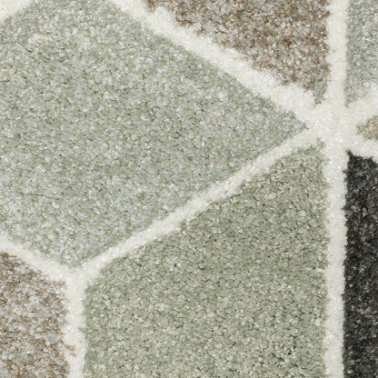 7' x 10' ivory gray and charcoal geometric area rug.