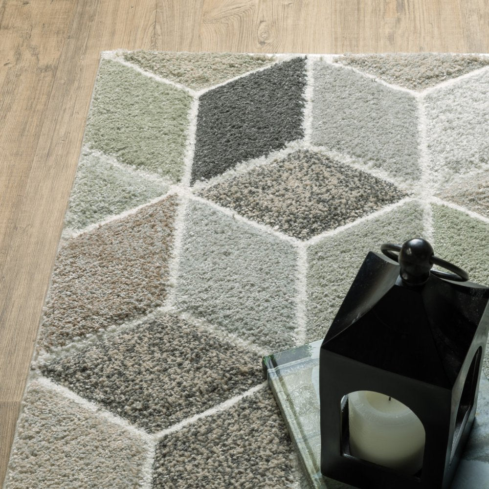 10' x 13' beige, brown, grey, tan, sage and pale blue geometric power loom stain resistant area rug