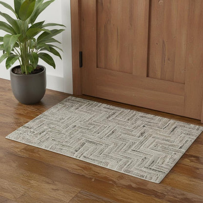 3' X 5' Ivory Beige Grey Brown Pale Blue And Charcoal Geometric Power Loom Stain Resistant Area Rug