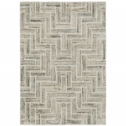 3' X 5' Ivory Beige Grey Brown Pale Blue And Charcoal Geometric Power Loom Stain Resistant Area Rug