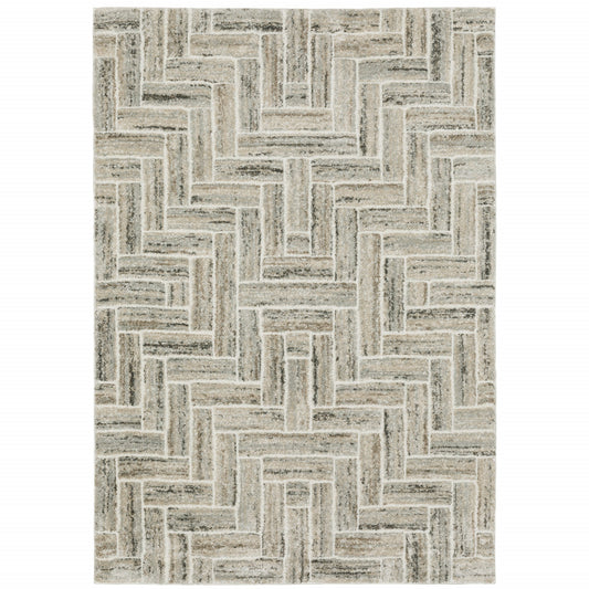 5' X 8' Ivory Beige Grey Brown Pale Blue And Charcoal Geometric Power Loom Stain Resistant Area Rug