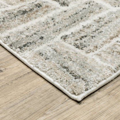 7' X 10' Ivory And Beige Geometric Area Rug