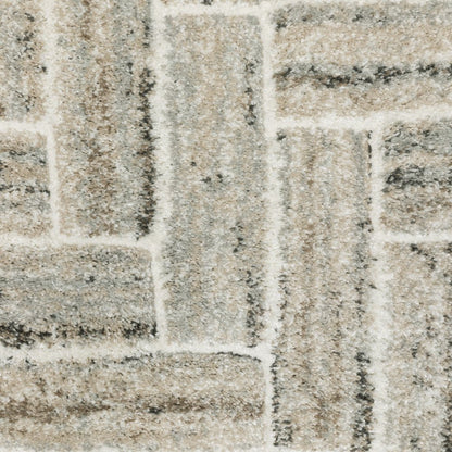 7' X 10' Ivory And Beige Geometric Area Rug
