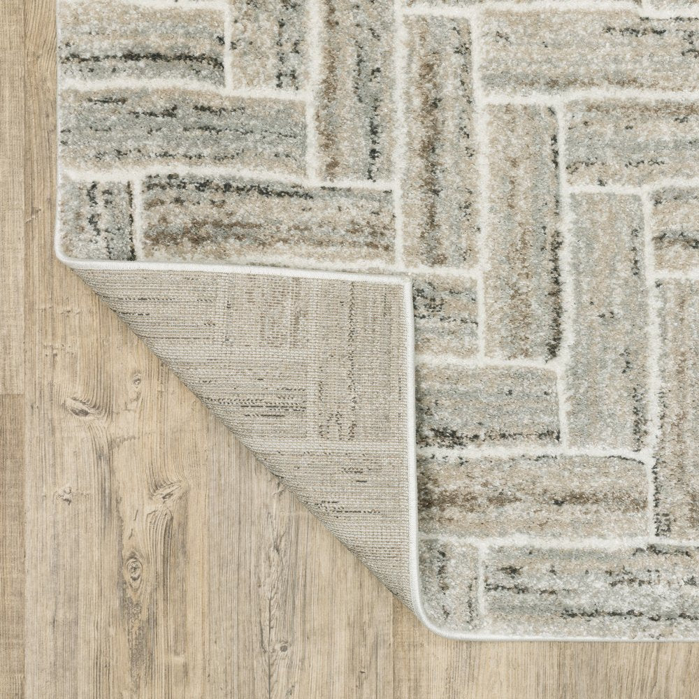 7' X 10' Ivory And Beige Geometric Area Rug