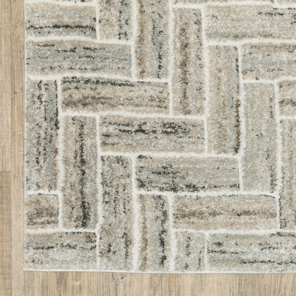 7' X 10' Ivory And Beige Geometric Area Rug