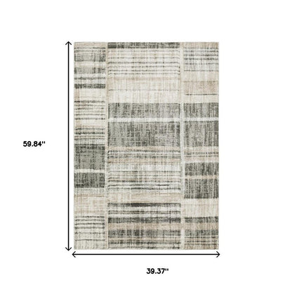 3' X 5' Grey Charcoal Ivory Tan Brown And Beige Geometric Power Loom Stain Resistant Area Rug