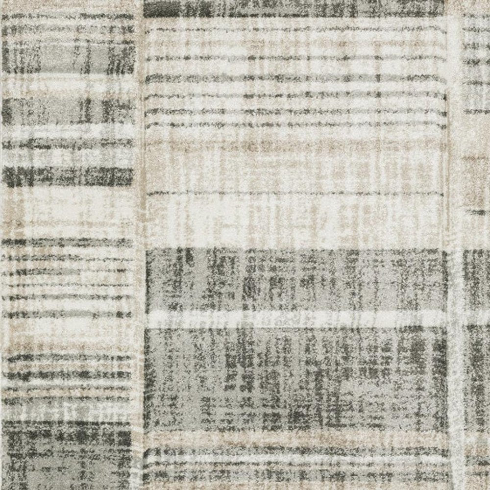 3' X 5' Grey Charcoal Ivory Tan Brown And Beige Geometric Power Loom Stain Resistant Area Rug