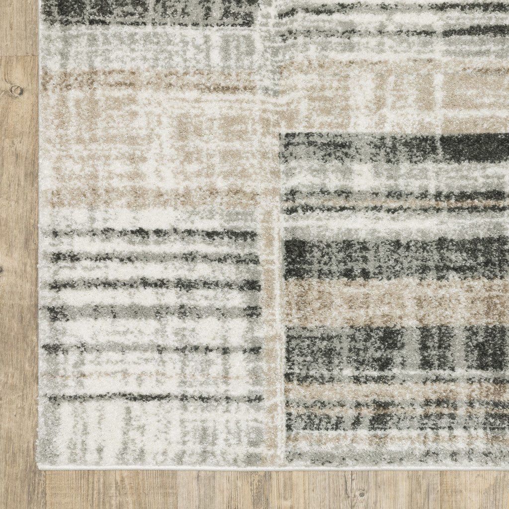 5' X 8' Grey Charcoal Ivory Tan Brown And Beige Geometric Power Loom Stain Resistant Area Rug